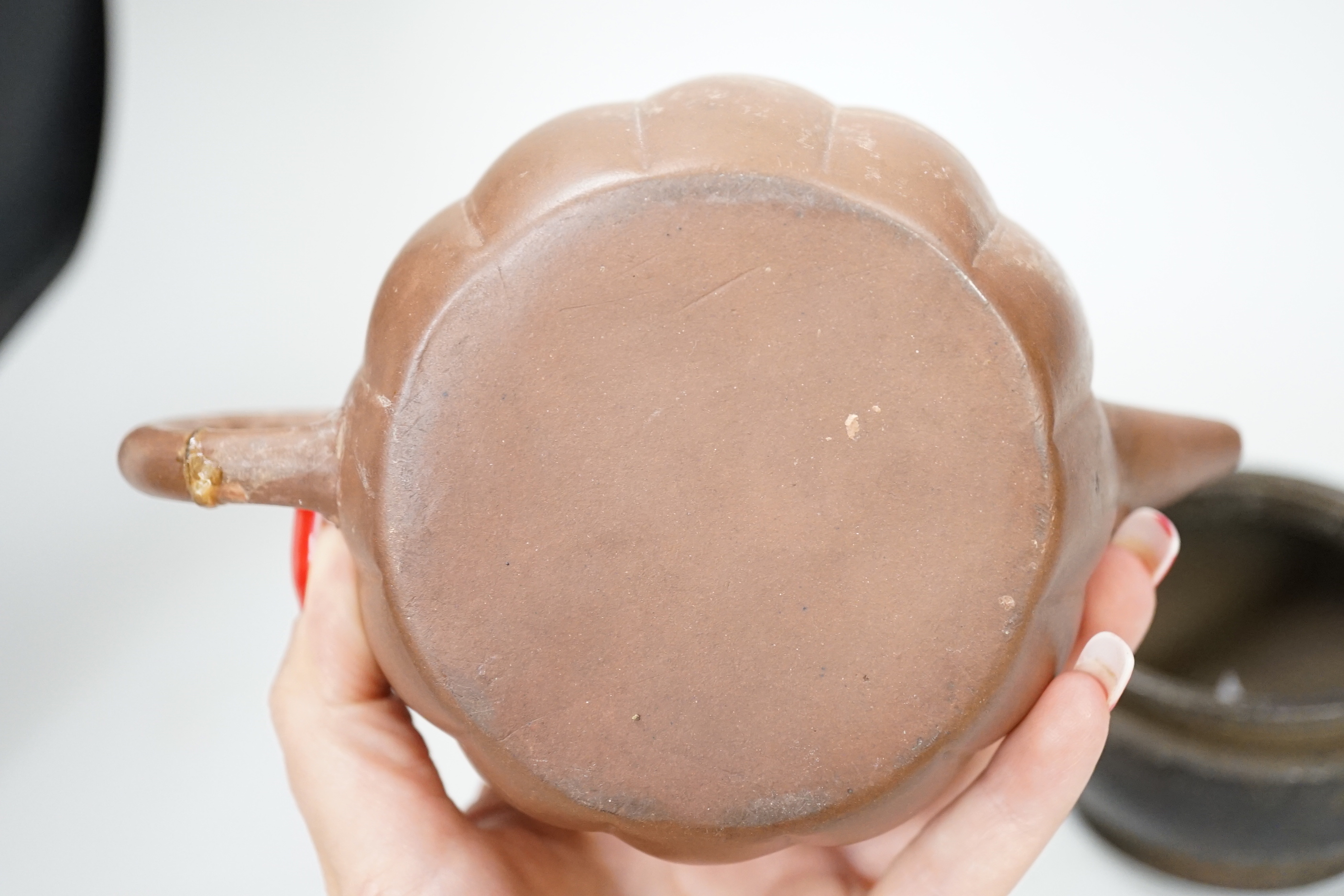 A Chinese Yixing teapot and a bronze censer, teapot 10 cm high